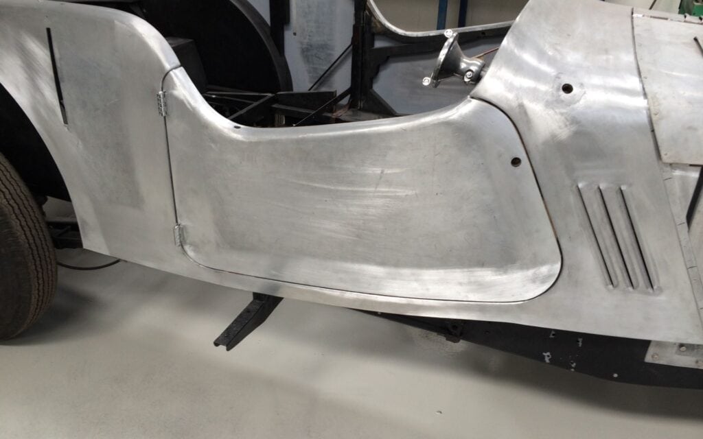 Vintage car bodywork in progress at Luke Martin Coachworks.