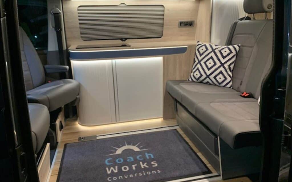 Interior of a custom camper van by Luke Martin Coachworks.